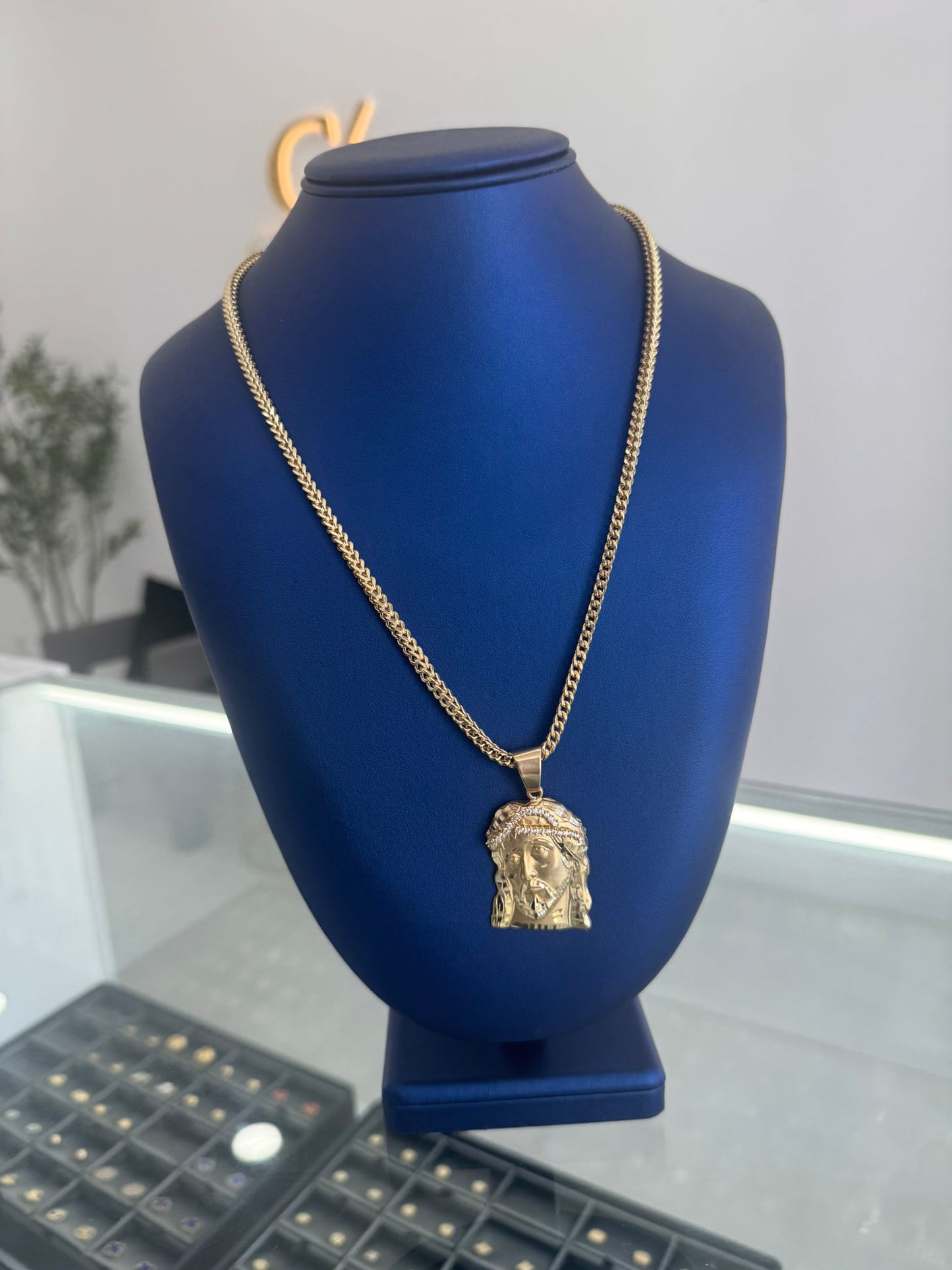 Franco chain with 10k gold Christ pendant