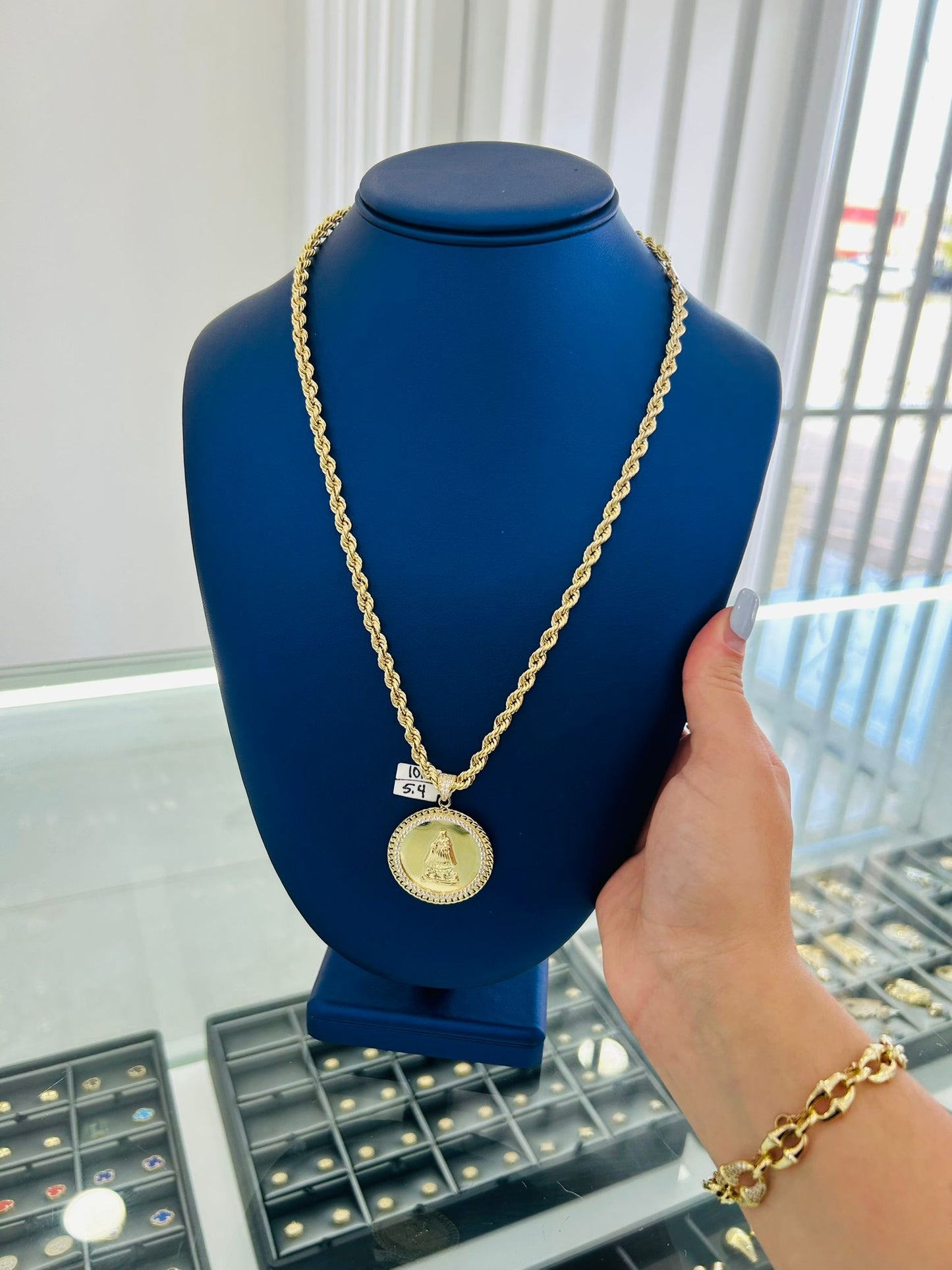 rope chain with 10k gold pendant